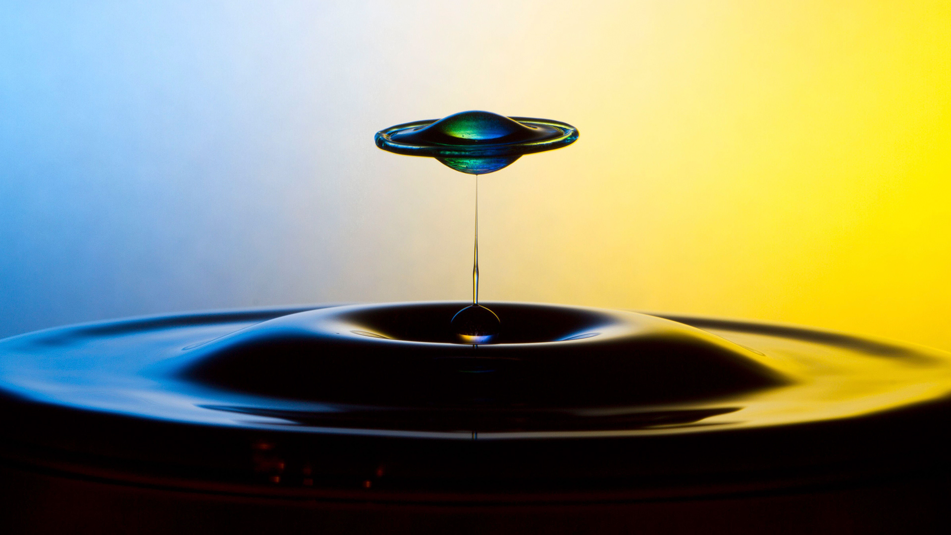 Planet, drop fast motion macro photo