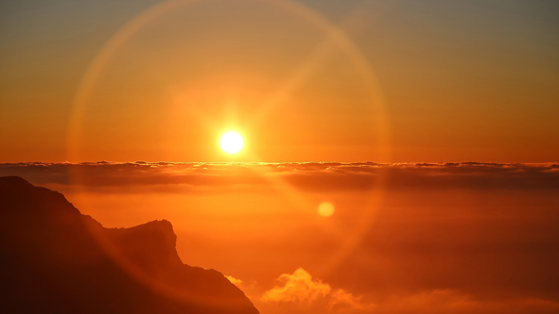Sunset above the clouds, near Jabal Jais in Ras Al Khaimah, UAE