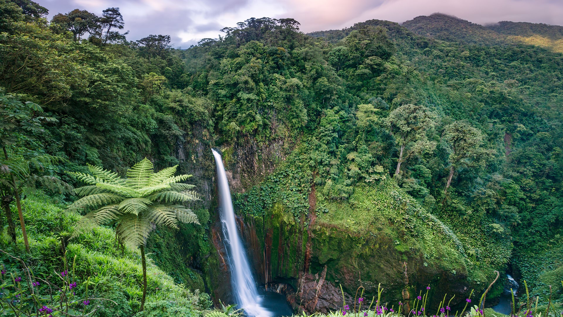Sunset over Catarata del Toro waterfall, Costa Rica