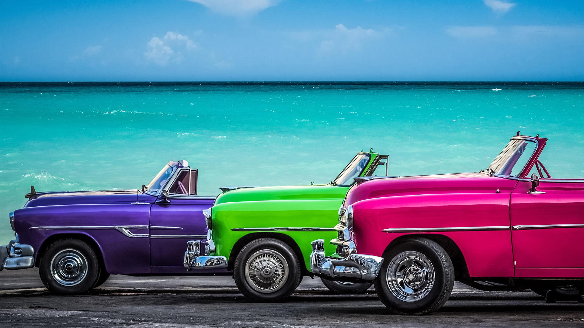 Chevrolet Cabriolet classic cars before the Caribbean Sea on the Malecón, Havana, Cuba