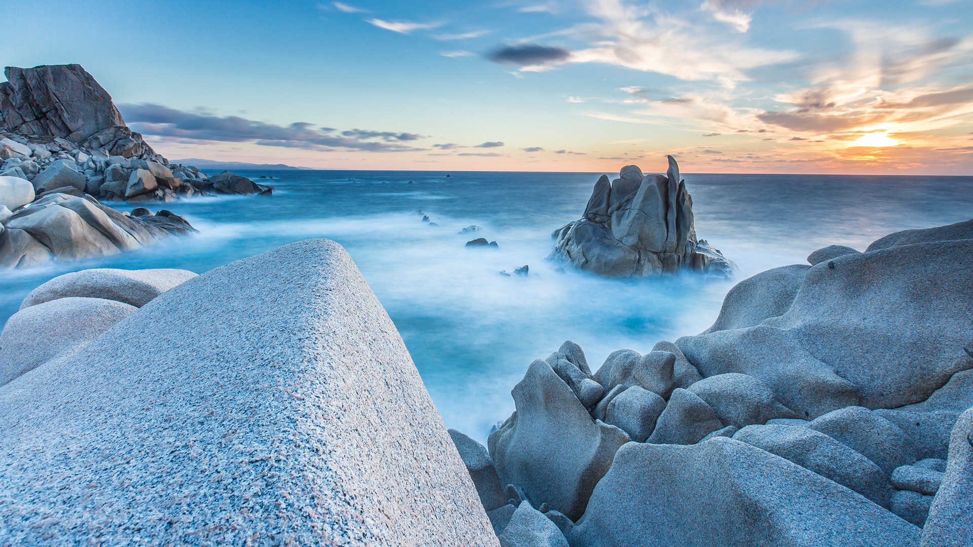 Waves on rocks of Capo Testa Peninsula, Santa Teresa di Gallura, Sardinia, Italy