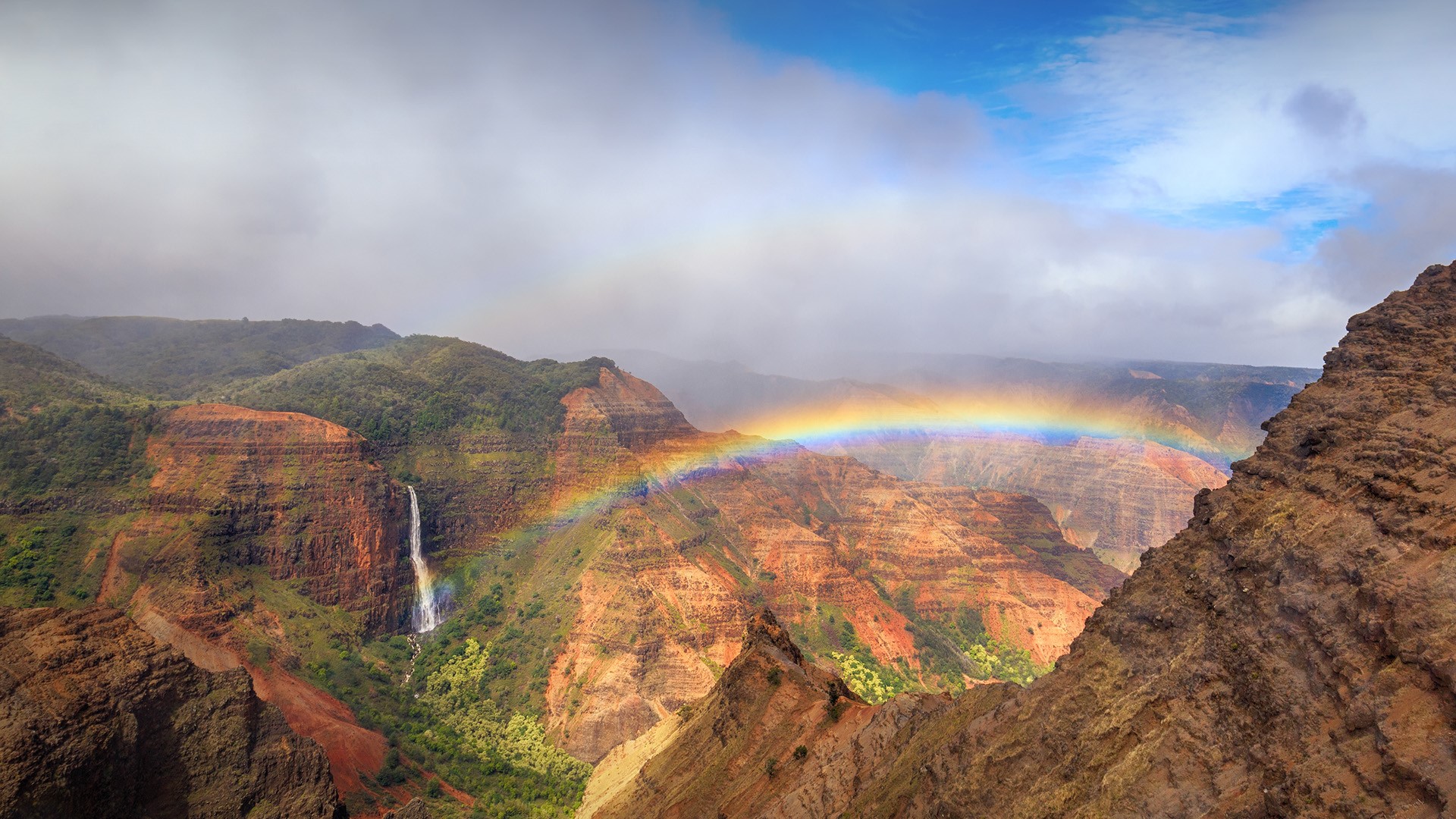 Rainbow over Waimea Canyon in Kauai, Hawaii, USA
