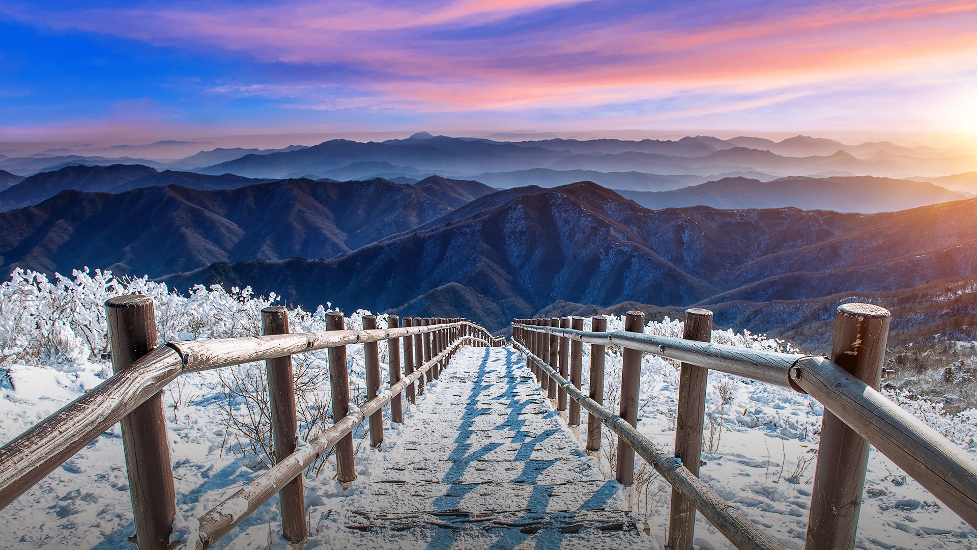 Staircase on Deogyusan mountains covered with snow in winter at sunrise, South Korea