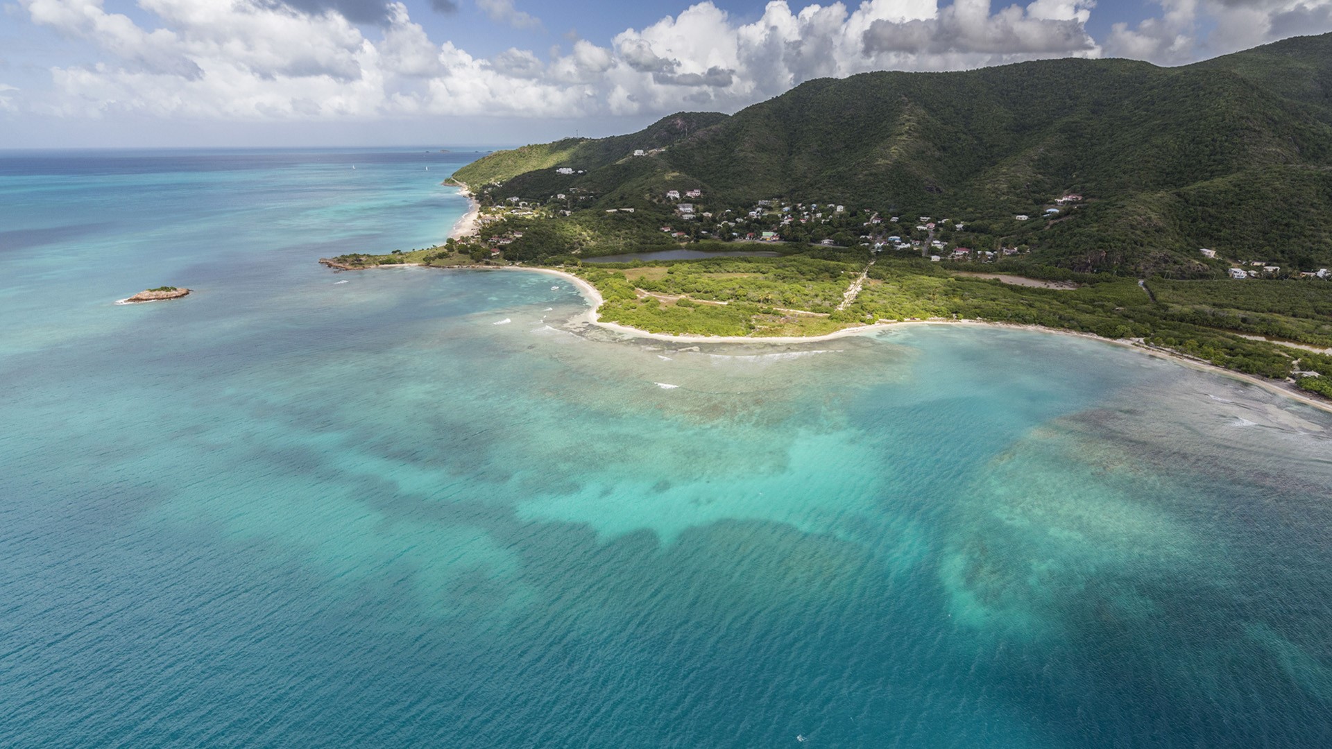Aerial view of the Caribbean Sea and vegetation on the isle of Antigua, Leeward Islands, West Indies