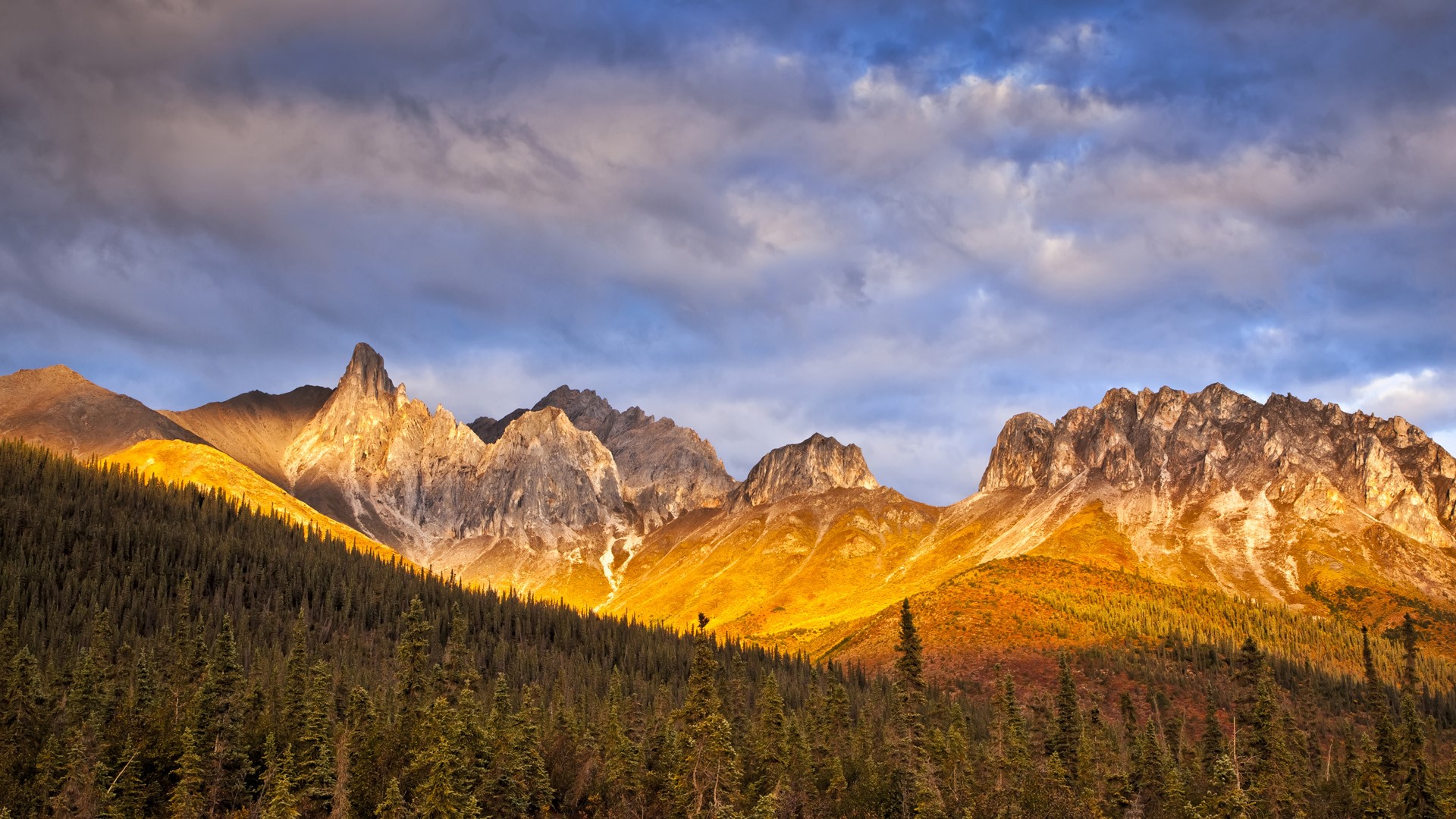 Autumn sunset glow on Snowden Mountain in the Brooks Range, Dalton Hwy, Alaska, USA