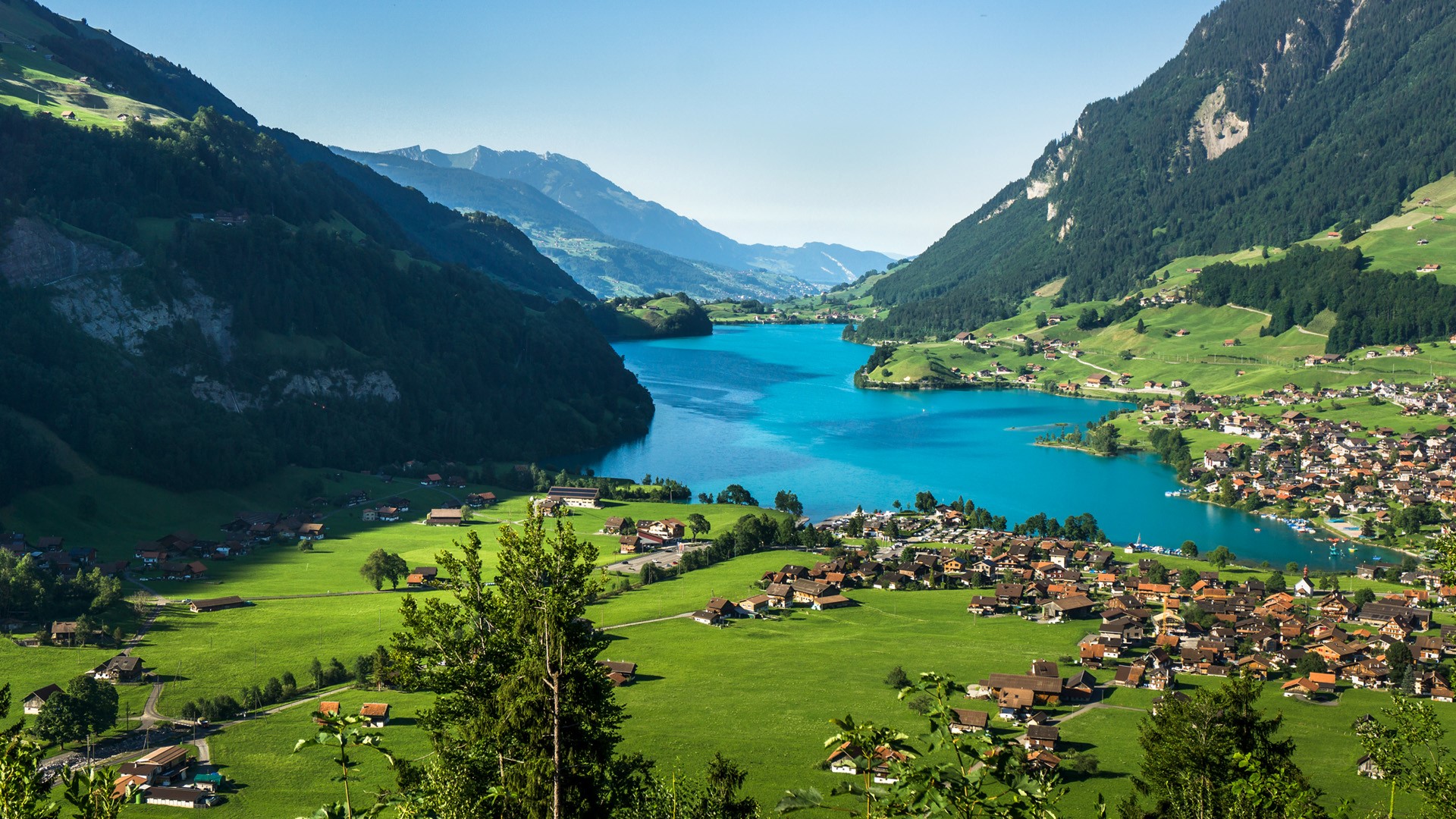 Town and Lake Lungern (Lungerersee) view from Bruenigpass, Obwalden, Switzerland