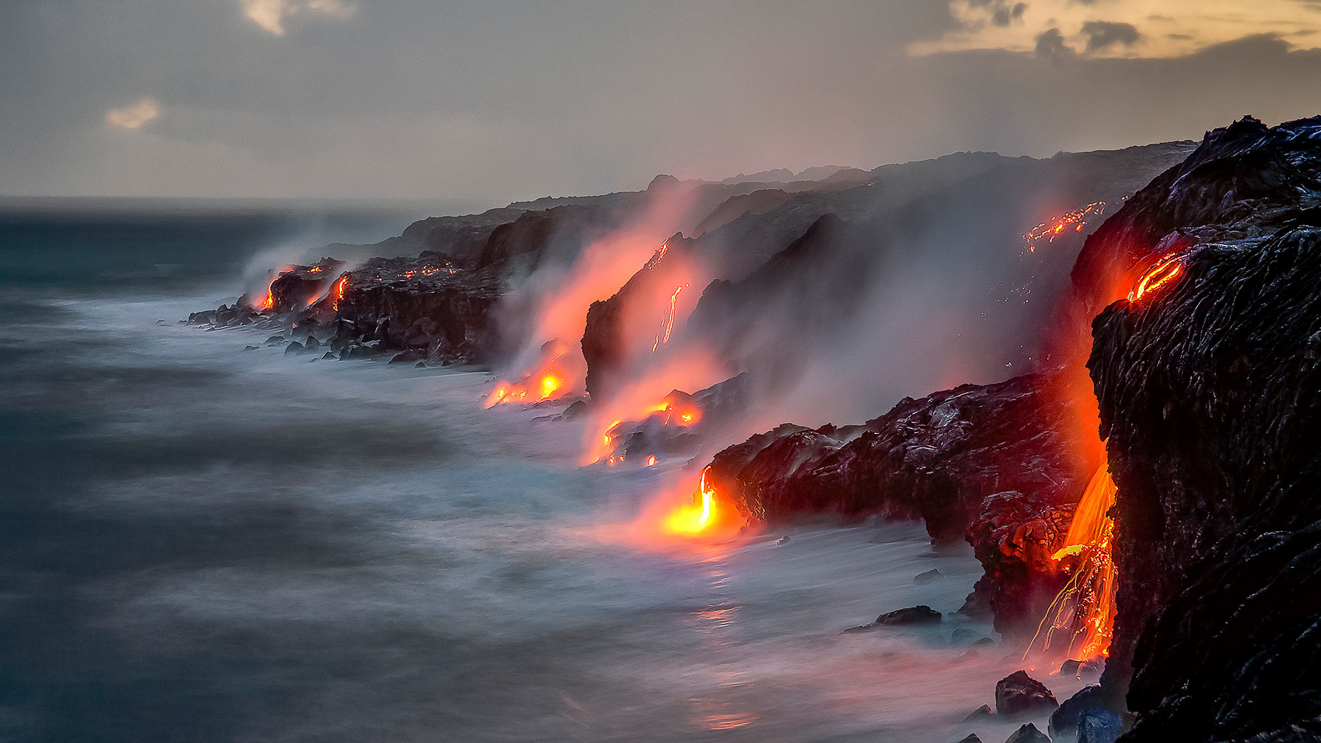 A series of lava flows spill into the ocean, Big Island, Hawaii