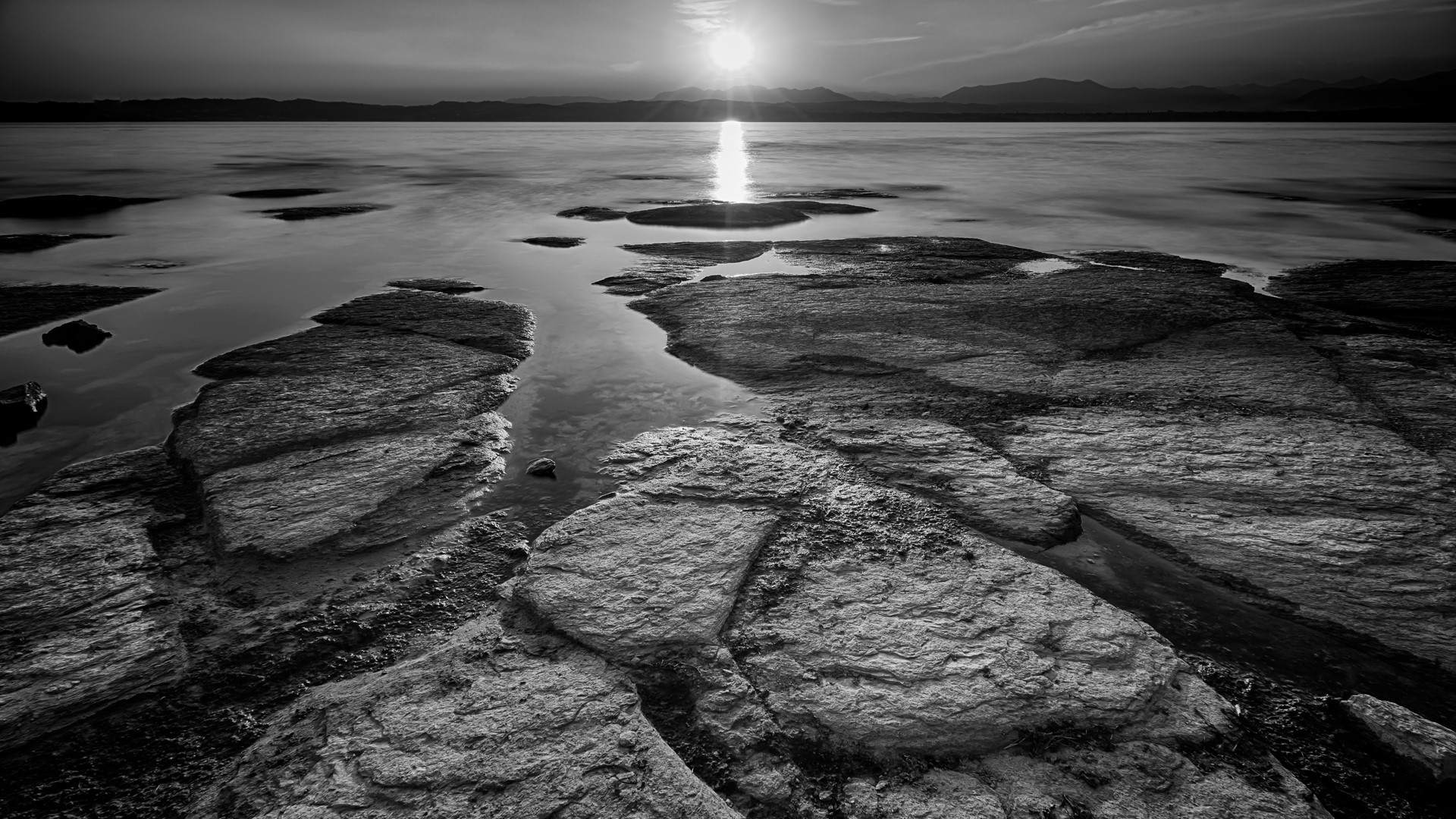 Garda lake (Lago di Garda) during a sunset, Sirmione, Italy