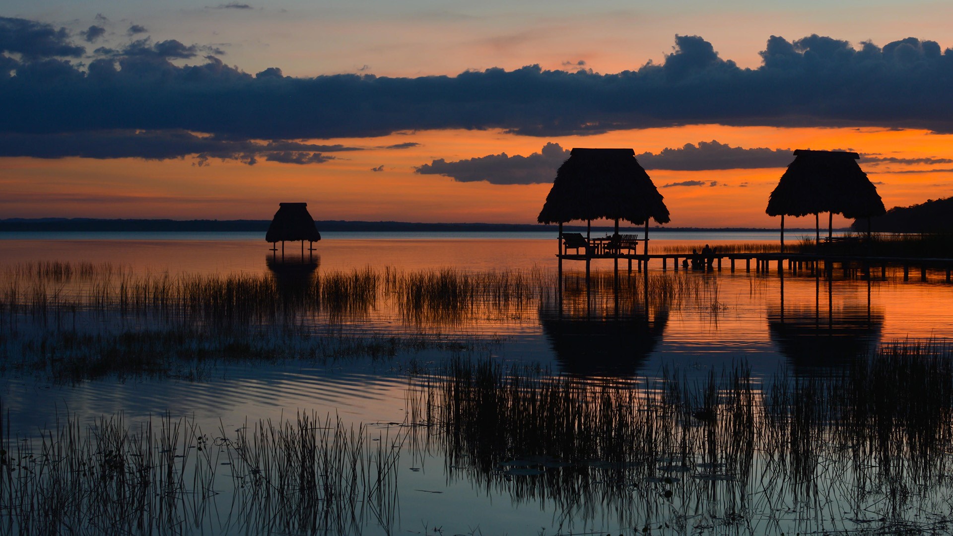 Sunset at the lake Petén Itzá in El Ramate, Guatemala